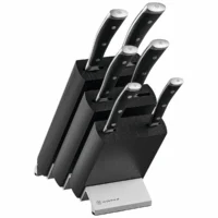 Bloque de cuchillos Wüsthof Classic Ikon de madera negra con base metálica y seis piezas sobre fondo blanco.
